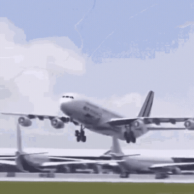 Man Standing In Front Of Airplane GIF