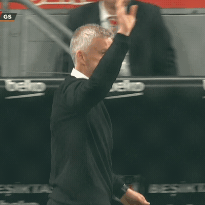 Man Standing In Front Of Beko Ad GIF