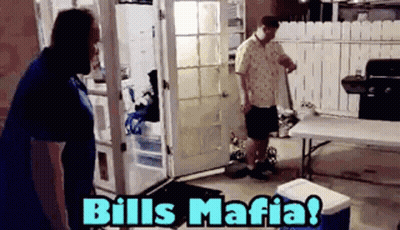 Man Standing in Front of Bills Mafia Door