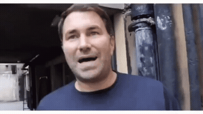 Man Standing In Front Of Building Mouth Open GIF