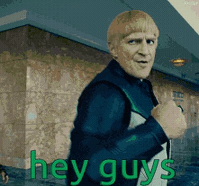 Man Standing In Front Of Building Saying Hey Guys GIF