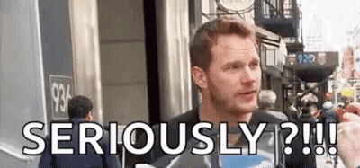 Man Standing In Front Of Building Saying Seriously GIF