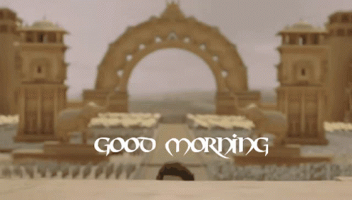 Man Standing In Front Of Building With Good Morning GIF