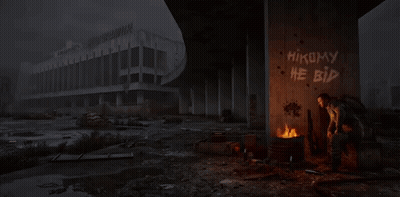 Man Standing in Front of Burning Barrel Saying Hikomy He Bid