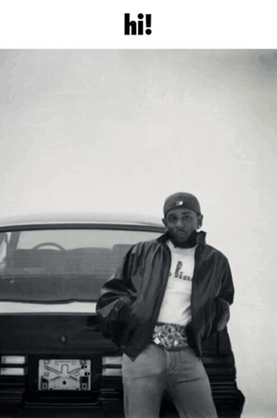 Man Standing In Front Of Car Saying Hi GIF