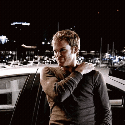Man Standing In Front Of Car With Arm On Shoulder GIF