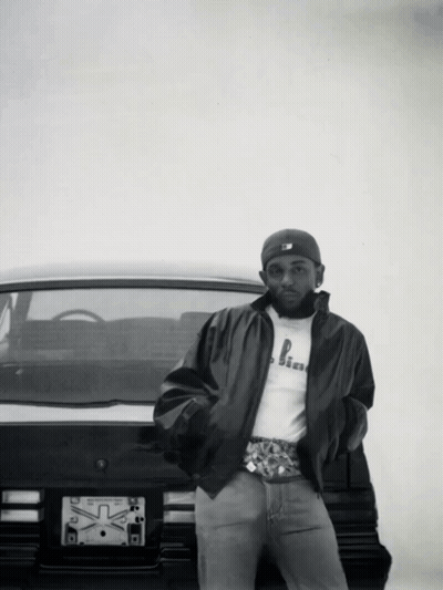 Man Standing In Front Of Car With X License Plate GIF
