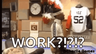 Man Standing In Front Of Clock And Jersey Number 52 GIF