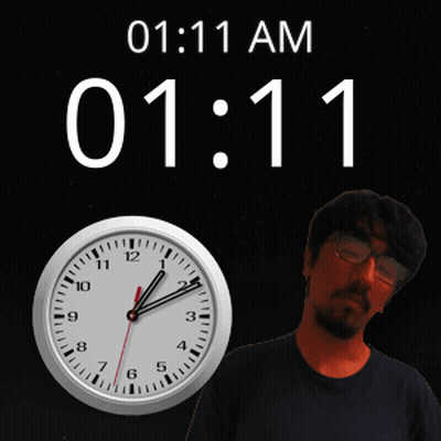 Man Standing in Front of Clock Saying 1:11