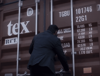 Man Standing In Front Of Container Saying TGUB GIF