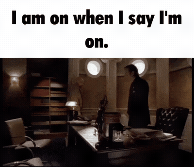 Man Standing In Front Of Desk Saying I Am On GIF