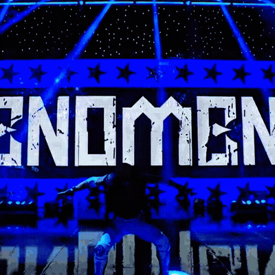 Man Standing In Front Of Endomen Sign GIF