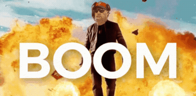 Man Standing In Front Of Explosion Saying Boom GIF