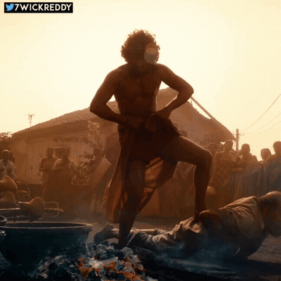 Man Standing In Front Of Fire 7Wickreddy GIF