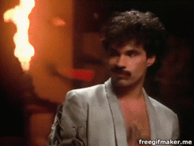 Man Standing In Front Of Fire Freegifmaker.me GIF