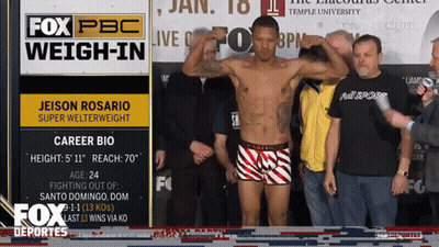 Man Standing In Front Of Fox PBC Sign GIF