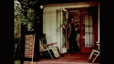 Man Standing In Front Of Glass Door GIF