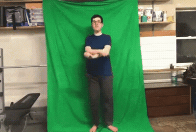 Man Standing In Front Of Green Screen GIF