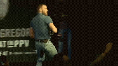Man Standing In Front Of Gregor Sign GIF