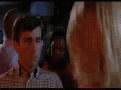 Man Standing In Front Of Hope You Have A Big Trunk Sign GIF