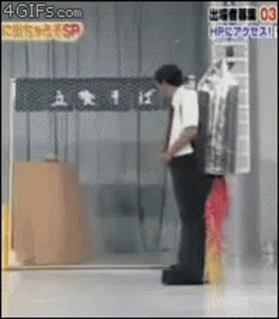 Man Standing In Front Of HP Sign GIF
