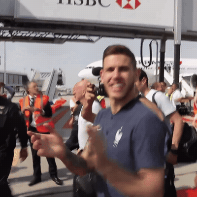 Man Standing In Front Of HSBC Sign GIF