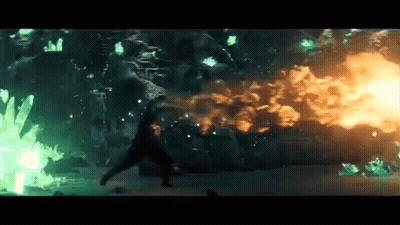 Man Standing In Front Of Huge Explosion GIF