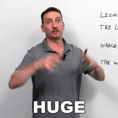 Man Standing In Front Of Huge Whiteboard GIF