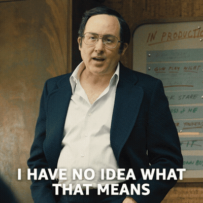 Man Standing In Front Of In Production Board GIF