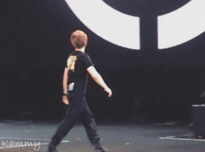 Man Standing In Front Of Kammy Drum Set GIF