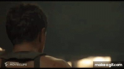 Man Standing In Front Of Lantern GIF