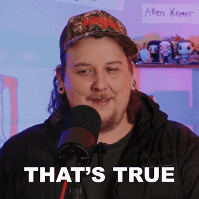 Man Standing In Front Of Microphone With True On Chest GIF