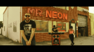 Man Standing In Front Of Neon Sign GIF