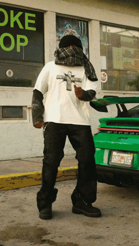 Man Standing In Front Of Oke Store GIF