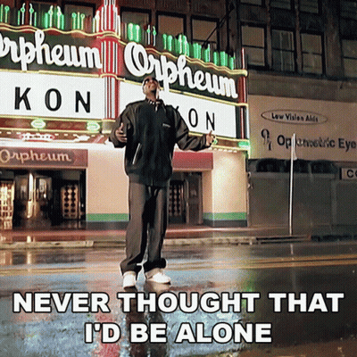 Man Standing In Front Of Orpheum Sign GIF