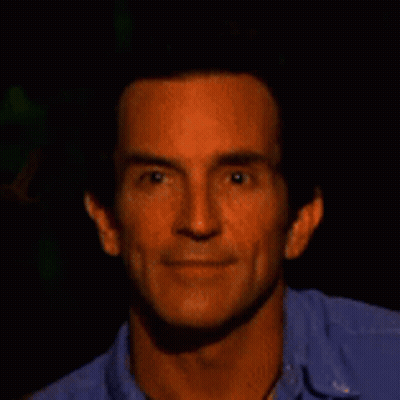 Man Standing In Front Of Outplay Outlast Sign GIF
