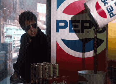 Man Standing In Front Of Pepsi Advertisement GIF
