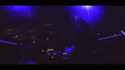 Man Standing In Front Of Pioneer Turntable GIF