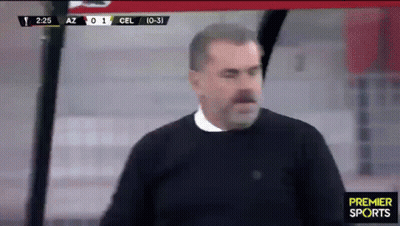 Man Standing In Front Of Premier Sports Scoreboard GIF