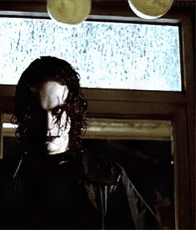 Man Standing In Front Of Rainy Window GIF
