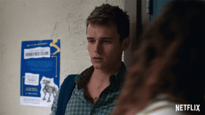 Man Standing In Front Of Robotics Club Sign GIF