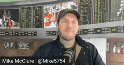 Man Standing In Front Of Screen With Name Mike GIF