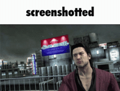 Man Standing In Front Of Screenshotted Sign GIF