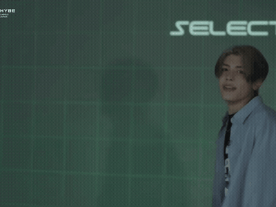 Man Standing In Front Of Select Game Screen GIF