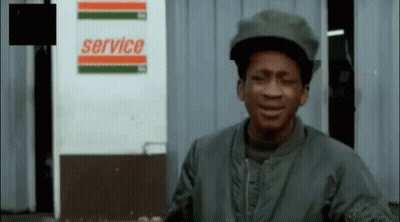 Man Standing In Front Of Service Sign GIF
