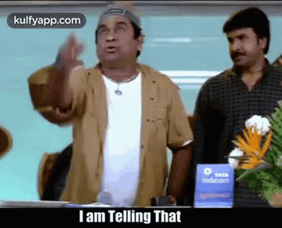 Man Standing In Front Of Sign Saying I Am Telling That GIF