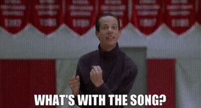 Man Standing In Front Of Sign What's With The Song GIF