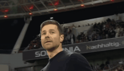 Man Standing In Front Of Sonia Banner GIF