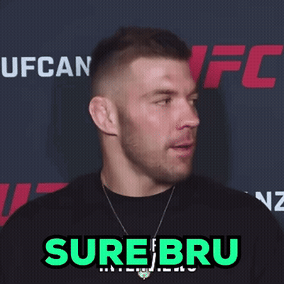 Man Standing In Front Of Sure Bru Sign GIF