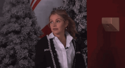 Man Standing In Front Of Talent Sign GIF